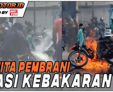 Video Detik-Detik Seorang Wanita Berhijab Padamkan Motor Yang Terbakar
