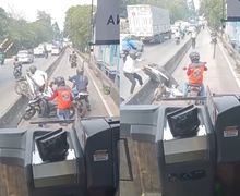 Video Pemotor Gagal Angkat Motor Demi Lolos dari Polisi di Busway, Netizen: Lolos Kagak, Rusak Iya